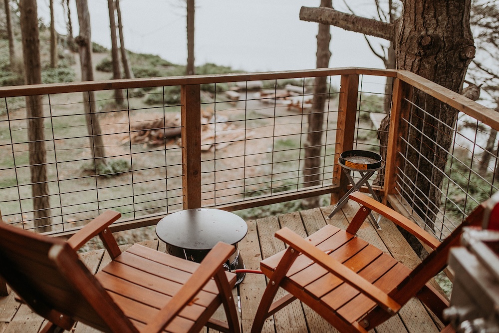 Deck chairs overlooking a beach at one of our Olympic National Park lodging properties